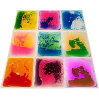 Kore Design - Carreaux de sol liquides - Couleurs assorties - Carrés - 12 po x 12 po x 0,2 po - Ensemble de 9-Dansez, jouez et apprenez : ces dalles sensorielles en forme de disque enfermées dans du liquide sont durables, résistantes aux déchirures et aux fuites, garantissant une résistance aux jeux, à la danse et aux sauts. Avec un dos antidérapant, elles restent bien en place pendant le jeu