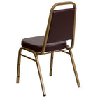 Flash Furniture – Chaise banquet empilable HERCULES à dossier trapèze, siège 2,5 po, doré, vinyle brun (FDBHF1AGBN)-Conception à dossier trapèze
