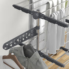 HOMCOM - Séchoir à vêtements à 4 niveaux avec roulettes pour intérieur et extérieur - gris-Livré avec 6 roulettes universelles en PP, dont 2 verrouillables 