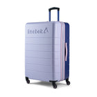 Reebok - Valise à roulettes pivotantes à coque rigide 30 po Double Dribble - Lilas-Roulettes pivotantes à 360° pour un déplacement fluide, silencieux et sans effort