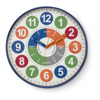 Monarch Specialties - 9101 Horloge Murale Juvénile Rond de 18" - Visage Multicolore/Cadre Bleu-Cette horloge murale ronde de 18 pouces est dotée d'un cadran multicolore et d'un élégant cadre bleu, ce qui en fait un élément décoratif remarquable dans n'importe quelle chambre d'enfant