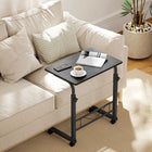 HOMCOM - Bureau debout mobile à hauteur réglable - 23,5 po L x 15,75 po l x 30,75 po H - noir-Facile à déplacer grâce à quatre roulettes pivotantes et des freins qui permettent de maintenir cette table de canapé en place 