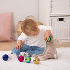 TickiT - Boules de réflexion sensorielles colorées mystérieuses - Lot de 6-L'ensemble comprend 6 couleurs : argent, or, rose, bleu, vert et violet. Et chaque boule a un contenu différent, qui change ses caractéristiques lorsqu'elle est roulée ou secouée