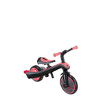 Globber - Tricycle Explorer – Rose Corail-Selle réglable avec 2 hauteurs (31 cm, 34 cm du sol), fabriquée en TPR doux et antidérapant, et guidons incurvés avec poignées ergonomiques en TPR durable pour un trajet confortable