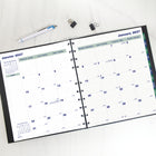 Blueline - 2027 agenda mensuel 16 mois MiracleBind avec reliure à double spirale – 10 3/4 po x 8 1/2 po – noir – bilingue-Format de page: 10-3/4 po H x 8-1/2 po l