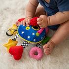 Manhattan Toy - Jouet d'éveil pour poussette Baby Whoozit 6"-Les bras comportent des instruments sonores cachés : hochets, couineurs et papier froissé