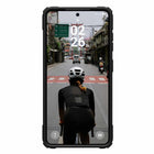 UAG - Étui Plasma XTE Rugged avec béquille et aimants pour Samsung Galaxy S26, Noir/Orange-Eco : TPU noir fabriqué à partir de matériaux recyclés