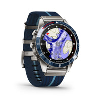 Garmin - Montre polyvalente moderne Capitaine MARQ (Gen 2)-Conçue pour vivre la vie à la barre, cette montre à outils moderne de luxe est dotee d'un bracelet en nylon tisse jacquard raye inspire de la course et d'un superbe ecran tactile AMOLED avec des commandes à bouton traditionnelles. Le boîtier de 46 mm est en titane grade 5 pour une conception ultradurable.