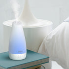Pure Enrichment - Diffuseur d'arômes PureSpa-Lumière d'ambiance douce : l'éclairage LED à couleur changeante en option crée une ambiance relaxante et une douce lueur nocturne tandis que la fonction ioniseur aide à améliorer l'humeur et à soulager le stress.