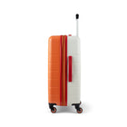 Reebok - Valise à roulettes pivotantes à coque rigide 26 po Double Dribble - Orange-Système d’extension à fermeture éclair offrant 20 % d’espace de rangement supplémentaire