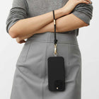 Ideal of Sweden - Bracelet de Téléphone - Noir-Comprend un anneau et un patch de fixation à connecter à la coque de votre téléphone (les coques de téléphone sont vendues séparément)