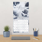 DateWorks - 2026 Calendrier Mural 16 Mois - 12 po x 12 po - Chanson Murmurée - Anglais -Comprend des pages mensuelles de janvier à décembre 2026, ainsi que les 4 derniers mois de 2025