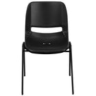 Chaise coquille noire pour enfants ergonomique et empilable de la série HERCULES avec hauteur de siège de 12 po.-Trous de drainage pour assister à sécher