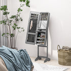HOMCOM - Armoire à bijoux avec miroir autoportante - 11,75 po L x 57,5 po l x 14,25 po H - gris-Comprend 3 étagères inférieures, 3 rangées de trous pour boucles d’oreilles, 5 crochets pour colliers, 3 tringles à foulards, un sac de rangement, des porte-bagues, 9 porte-crayons à sourcils, un miroir et une table rabattable 
