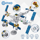 Contixo - Ensemble de blocs de construction de la station spatiale Aerospace Series - 573 pièces-Apprenez en jouant : explorez un univers d'éducation et d'excitation ! En assemblant votre station spatiale, vous absorberez des concepts scientifiques, une finesse architecturale et des secrets d'ingénierie. Aiguisez vos compétences en résolution de problèmes et pensez logiquement pendant que vous jouez
