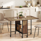 HOMCOM - Table à manger pliante à abattant sur roulettes 51 po avec étagère de rangement pour 6 personnes - grain de bois brun-6 roulettes pour un déplacement facile 6 avec freins pour plus de stabilité 