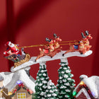 HOMCOM - Village de Noël lumineux animé avec Père Noël et renne-Excellent ajout à votre table d’entrée, manteau de cheminée, coiffeuse et table de chevet 