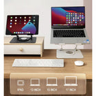 Uncaged Ergonomics - Travel Pack RISE Support pivotant pour ordinateur portable et chargeur de voyage - Argent-Pivotant Rise a un design léger.