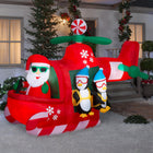 GEMMY - Hélicoptère gonflable de Noël animé avec pingouins parachutistes - 193 cm x 135 cm-Comprend des piquets et des attaches