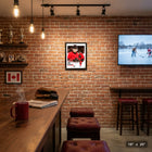 Frameworth - Nick Suzuki collage signature replica Hockey Canada 2026 - impression encadree - 16" x 20"-Collage professionnel presentant plusieurs photos d'action de Suzuki dans le chandail Hockey Canada 2026 avec signature replica. Cadre en bois composite noir avec verre veritable