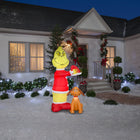 GEMMY - Grinch gonflable de Noël mettant un bonnet de Père Noël Max-Se gonfle automatiquement en quelques secondes et se dégonfle pour un rangement facile