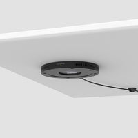 Humanscale - NeatCharge-Pas de points de contact - placez simplement votre appareil mobile sur la table pour le recharger.