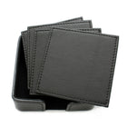 Ashlin® Ensemble de 8 sous-verres avec boîte Yorkshire, noir-Protégez la table de la salle de conférence de votre bureau ou les tables de votre maison avec cet ensemble de sous-verres élégants en cuir. Les sous-verres mettent en vedette des bords entièrement retournés et des surpiqûres. Les sous-verres griffés de cet ensemble sont éternels. L'ensemble comprend un support deux pièces en cuir pour le rangement.
